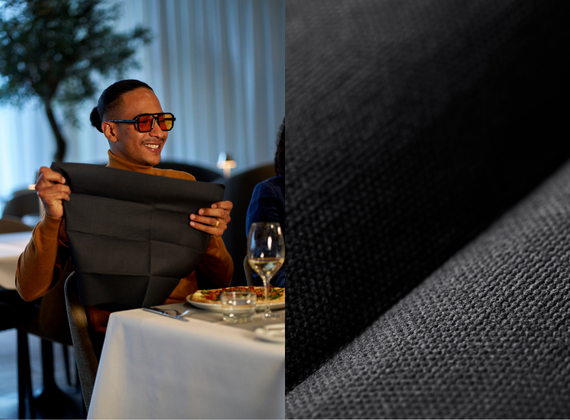 Person holding black dunilin napkin