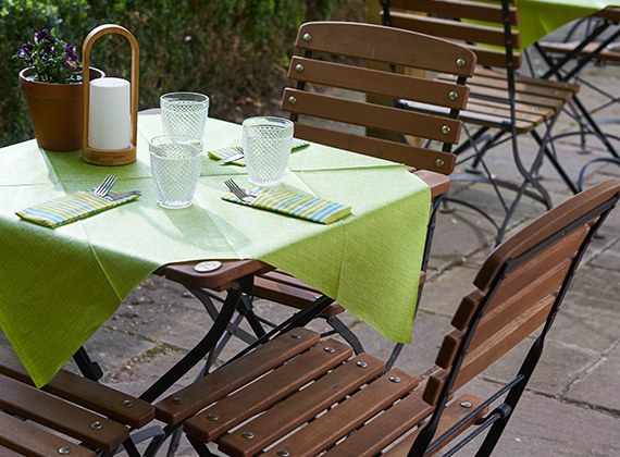 Kiwi green outdoor table cover on set table